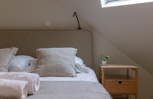 Westende Apartment | Huswell - Spacious top-floor apartment with private parking