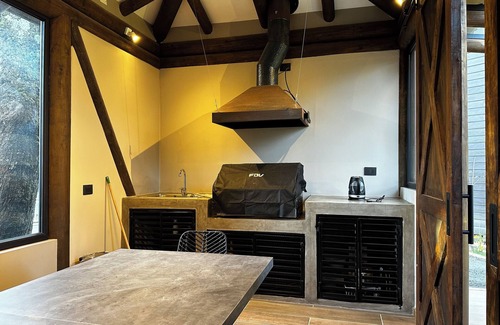 Pucon Apartment | Ideal for couples: centrally located studio with pool and parking.
