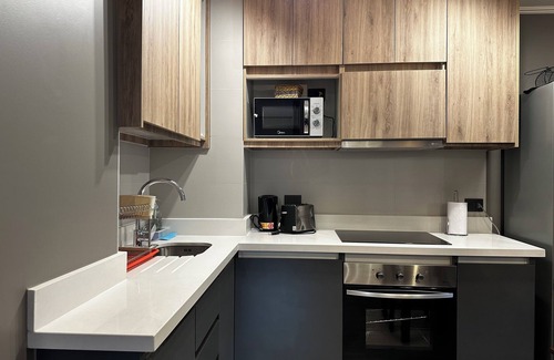 Pucon Apartment | Ideal for couples: centrally located studio with pool and parking.