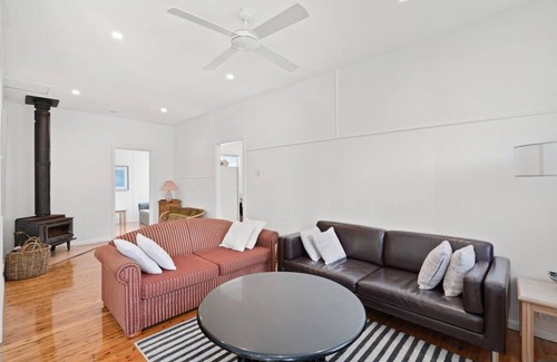 Bateau Bay House | Immaculate Beachside Home with Fireplace and Patio