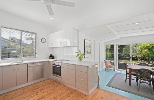 Bateau Bay House | Immaculate Beachside Home with Fireplace and Patio
