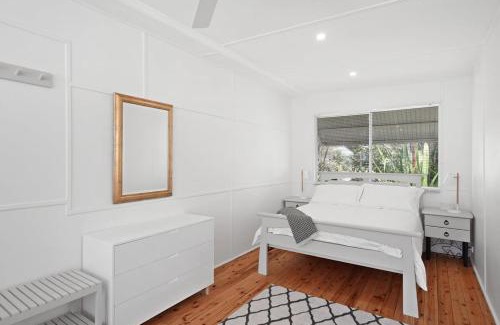Bateau Bay House | Immaculate Beachside Home with Fireplace and Patio