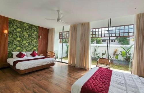 Vaikom Hotel | Indudharam Tourist Home - Vaikom Temple