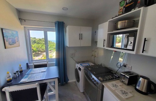 Corinthe Condo | Infinity Blue By The Sea