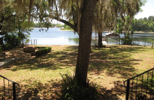 Edgar House | Island Lake Redwood Cottage With Canoe and Grill: Relax, Swim, Fish, Ski, Enjoy
