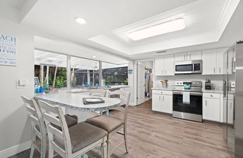 Villa De Palmas House | Island Paradise~ Heated Pool~ Family Fun~ Near Beach