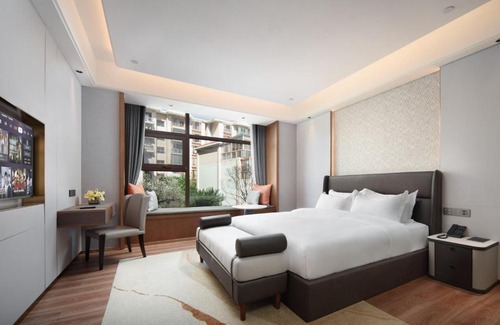 Panlong Hotel | Join Hands Bless Hotel