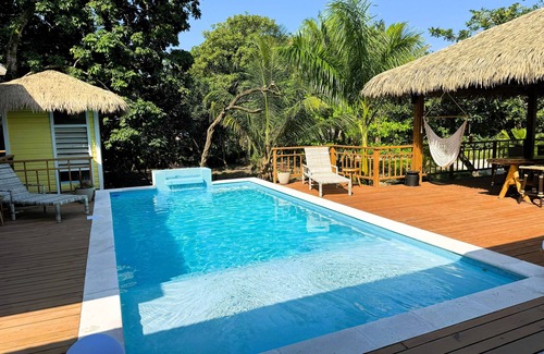 Palmetto Bay House | Jungle HideAway Beach House! Pool, Cabana, Palapa, Resort Amenities, & More!
