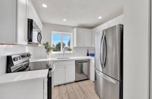 Sea Palms Condo | Jupiter Bay Resort Condo, steps to the beach! Comfortably sleeps family of 4!