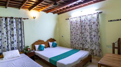 Pirmed Hotel | Kalpavanam Heritage Resort