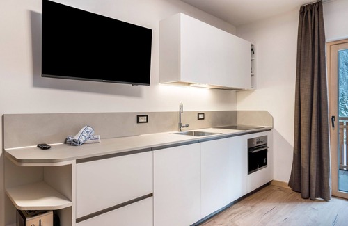 Campitello di Fassa Apartment | Kamerloy Apartments - C with Mountain View, Shared Garden and Wi-Fi