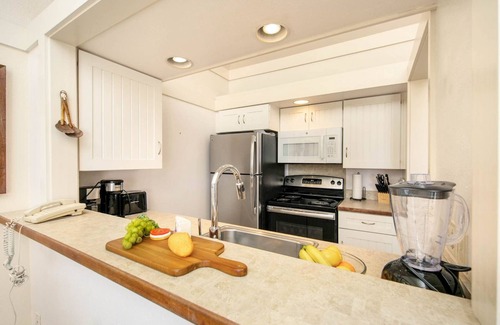 Poipu Condo | Kiahuna Plantation partial oceanview,top floor,4 min walk to beach, pool,gym,+AC