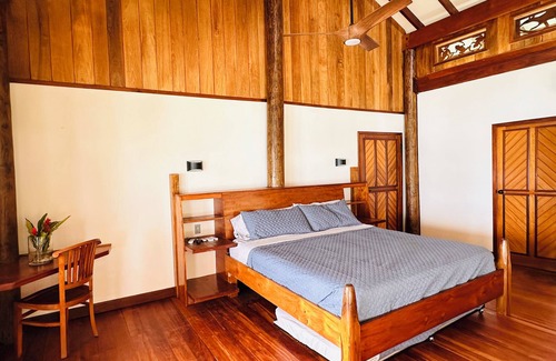 Carenero Island Bed & Breakfast | King Suite Ocean and Jungle View wrap around private balcony