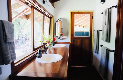 Carenero Island Bed & Breakfast | King Suite Ocean and Jungle View wrap around private balcony