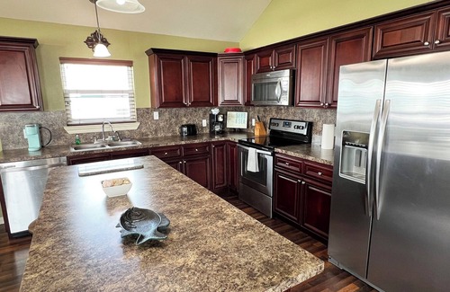 Golden Meadow House | Knot Workin - Boat Access - Island Realty