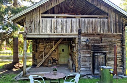 Rauma House | Kodikas hirsimökki - cozy log cottage
