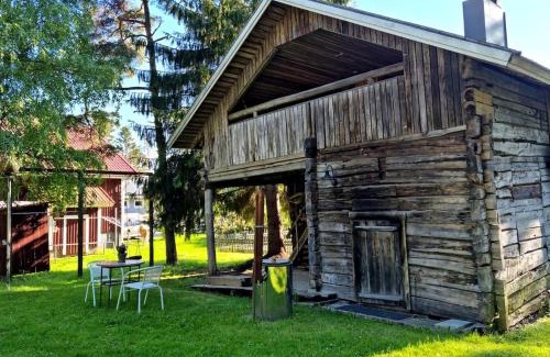 Rauma House | Kodikas hirsimökki - cozy log cottage