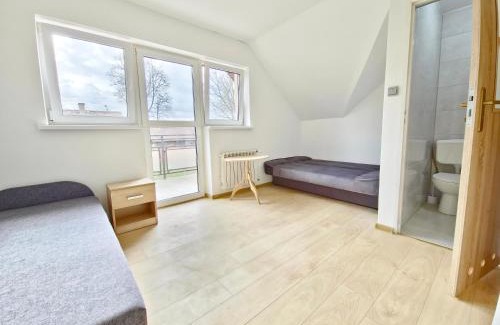 Szczytno House | Kompleks domków na Mazurach dla grupy 15 osobowej