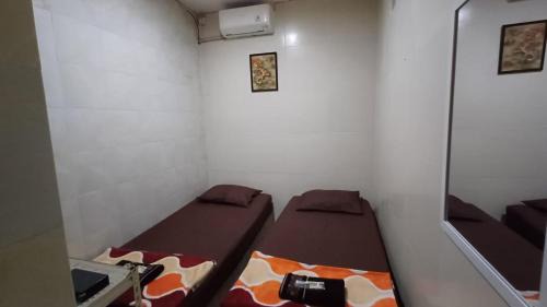 Bogor Timur Hotel | Kost Carmelia Syariah Baranangsiang Bogor