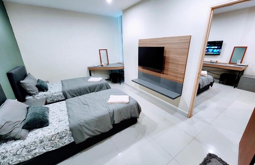 Batu Lintang Apartment | Kozi Square Twin Room with free Wi-fi & Carpark