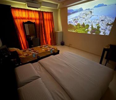 Gua House | KTC Suite Hotel with Private Cinema and PS5