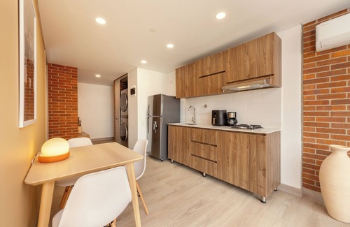 Laureles Apartment | Kyux Studios by MOME