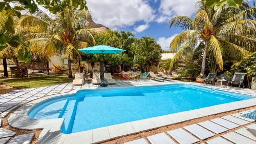 Tamarin Apartment | LAKAZ DEL SOL - Elegant apartments with luxurious garden, pool and barbecue area - Tourism Permit Certified