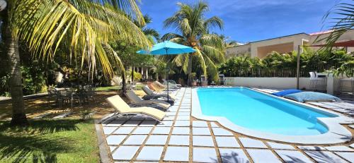 Tamarin Apartment | LAKAZ DEL SOL - Elegant apartments with luxurious garden, pool and barbecue area - Tourism Permit Certified