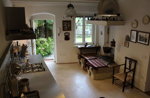 Torbole sul Garda House | Lake Garda: Idyllic villa in quiet village center with olive and palm trees garden