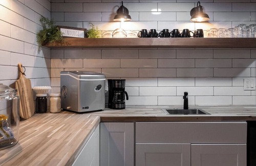 Athens House | Lake house with a game room