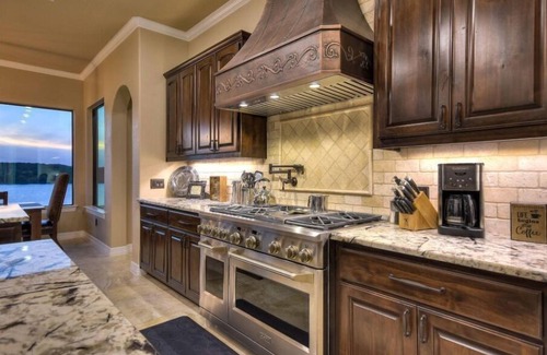 Highland Lake Estates House | Lake Travis DeepWaterfront Home: Views, Pool, Dock, Outdoor Kitchen, OpenAir Bar