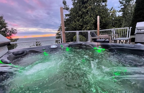 Brock House | Lakefront Cottage w/Hot Tub, BBQ Grill, Patio, Fire Pit, Dock, Sauna, Fire Place