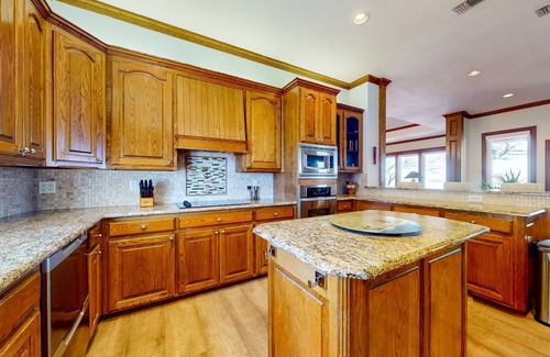 Bridgeport House | Lakefront estate with spectacular views, large deck, tiki bar, & private dock