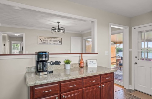 High Point House | Lakefront Getaway – 180° Water Views, 3 miles to HPU, Sunroom, Deck