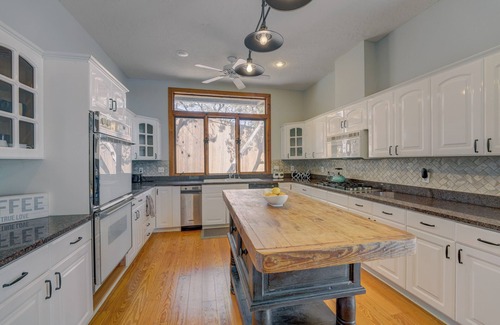 Burnet House | Lakeside Leisure - Peaceful waterfront home with a boat dock and game room.
