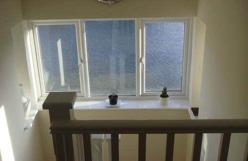 Peterborough House | Lakeside very large double en-suite bedroom with fabulous views and facilities