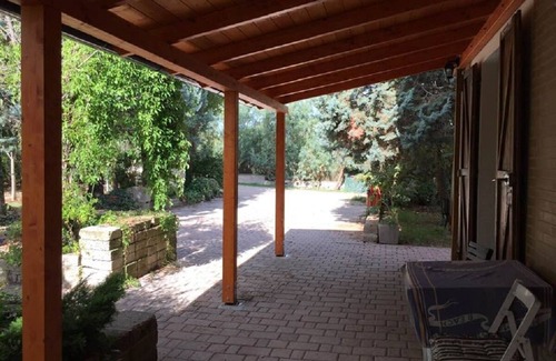 Fano House | Landhaushaelfte with 1ha natural garden and clear sea views