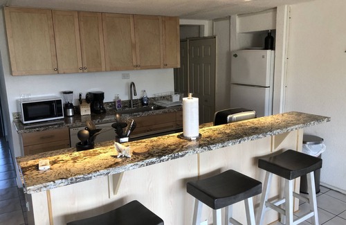 Estate Golden Rock Condo | Large Private Sun Deck With Ocean Views