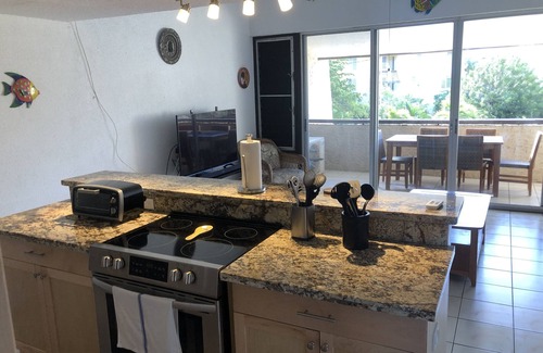 Estate Golden Rock Condo | Large Private Sun Deck With Ocean Views