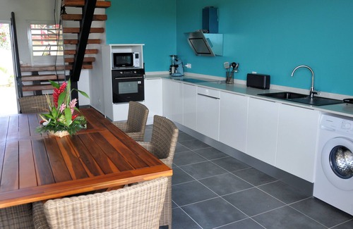 Le Moule Apartment | Lavender apartment, 3 air-conditioned bedrooms, and landscaped swimming pool