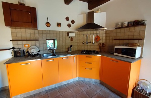 Comero Cottage | Le 2 formiche (Lauri): rustic cottage with terrace and garden