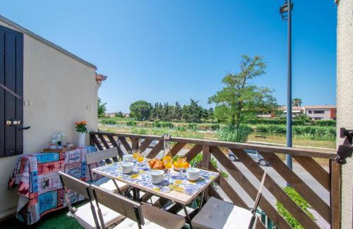 Aigues-Mortes Apartment | Le Camarguais Vue Canal A 2 pas des remparts d'Aigues-Mortes