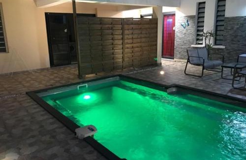 Saint-Andre Apartment | Le Flamboyant avec piscine chauffée 30° et Jacuzzi