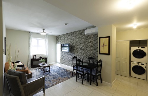 New Kingston Condo | "Le Luxe" Penthouse 1 BR Condo w/AC, complimentary Netflix, WiFi & 24/7 sec