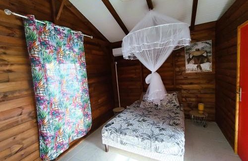 Anse-Bertrand House | Le Paradis des Colibris Gîte créole avec piscine table dhôtes et nature à Anse Bertrand