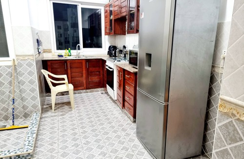 Kunduchi Apartment | Leisure and discovery Enjoy the sea breeze on a comfortable hammock.