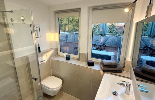 Kaltenweide Apartment | LGH-Moderne, ruhige Wohnung, Nähe zum Flughafen und Autobahn, 24h-self-check-in, vollausgestattet, DisneyPlus, Waschmaschine