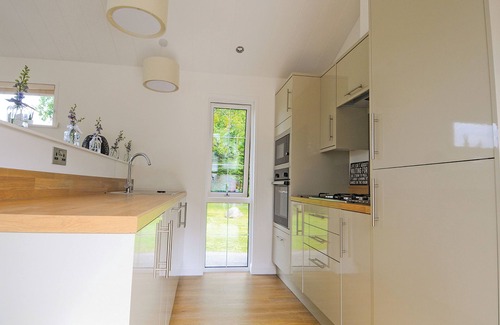 Low Newton Ski Chalet | Lodge with one king-size double with TV.