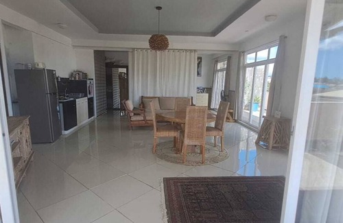 Flic-en-Flac Apartment | Loft in the center of Flic en Flac with corner terrace. 400m from the beachn