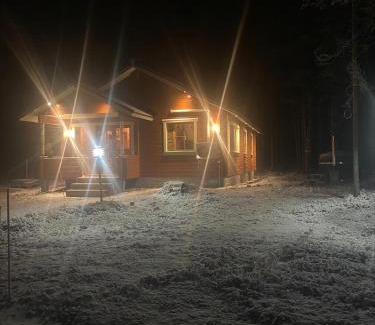 Syote Apartment | Lomanaamanka Naava-hirsimökki